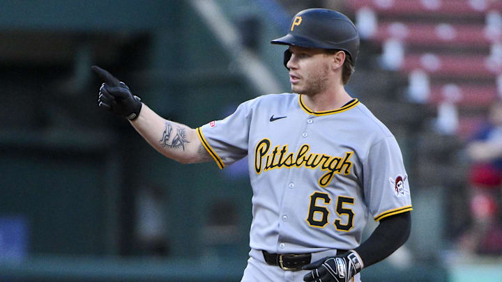 Aug 26, 2025; St. Louis, Missouri, USA;  Pittsburgh Pirates left fielder Jack Suwinski (65) reacts after hitting a one run double against the St. Louis Cardinals during the first inning at Busch Stadium. Mandatory Credit: Jeff Curry-Imagn Images