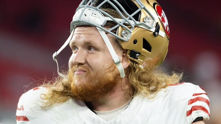 Jan 5, 2025; Glendale, Arizona, USA; San Francisco 49ers offensive tackle Austen Pleasants (62) against the Arizona Cardinals at State Farm Stadium. Mandatory Credit: Mark J. Rebilas-Imagn Images