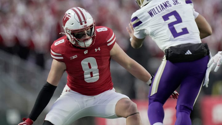 Wisconsin linebacker Mason Posa (8) tackles Washington quarterback Demond Williams Jr. (2) during the first quarter of their game Saturday, November 8, 2025 at Camp Randall Stadium in Madison, Wisconsin. Wisconsin linebacker Mason Posa (8) tackles Washington quarterback Demond Williams Jr. (2) during the first quarter of their game Saturday, November 8, 2025 at Camp Randall Stadium in Madison, Wisconsin.