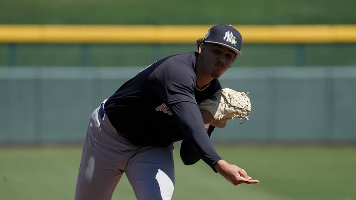 Mar 23, 2026; Mesa, Arizona, USA; New York Yankees pitcher Carlos Lagrange (84) throws against the Chicago Cubs in the first inning at Sloan Park. Mandatory Credit: Rick Scuteri-Imagn Images Mar 23, 2026; Mesa, Arizona, USA; New York Yankees pitcher Carlos Lagrange (84) throws against the Chicago Cubs in the first inning at Sloan Park. Mandatory Credit: Rick Scuteri-Imagn Images