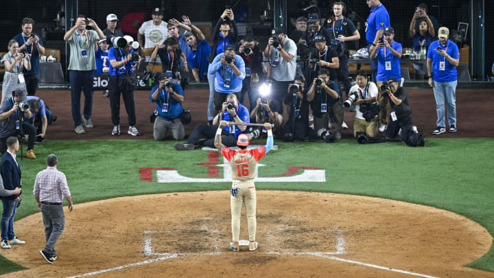 Jul 16, 2024; Arlington, Texas, USA; American League outfielder Jarren Duran of the Boston Red Sox (16) holds up the Ted Williams trophy after he is named the MVP in the American League win over the National League in the 2024 MLB All-Star game at Globe Life Field. Mandatory Credit: Jerome Miron-USA TODAY Sports