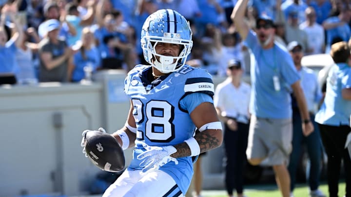 Oct 12, 2024; Chapel Hill, North Carolina, USA; North Carolina Tar Heels running back Omarion Hampton (28) runs for a touchdown in the third quarter at Kenan Memorial Stadium. Mandatory Credit: Bob Donnan-Imagn Images