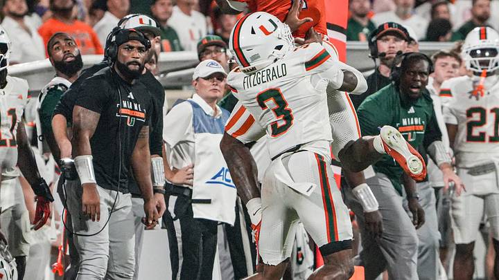 Clemson wide receiver T.J. Moore (1) makes a catch near Miami Hurricanes defensive back Bryce Fitzgerald (3) during the second quarter at Memorial Stadium Saturday, October 3, 2026. Clemson wide receiver T.J. Moore (1) makes a catch near Miami Hurricanes defensive back Bryce Fitzgerald (3) during the second quarter at Memorial Stadium Saturday, October 3, 2026.