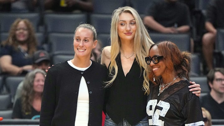 LA Sparks players Stephanie Talbot, Cameron Brink, and Lexie Brown pose before the game against the New York Liberty.