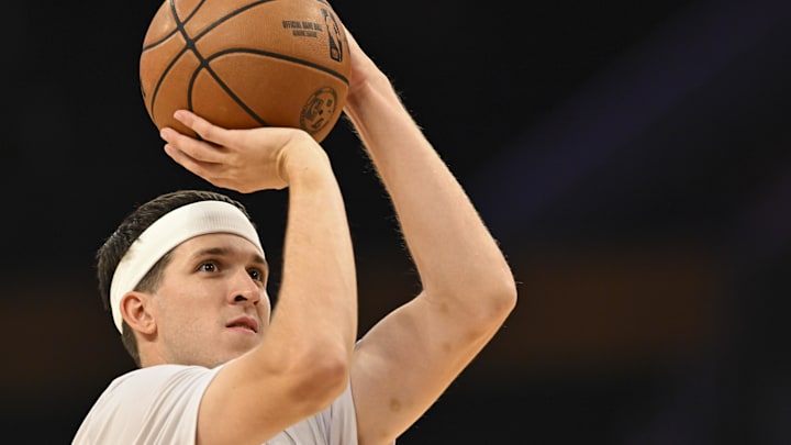 Nov 2, 2025; Los Angeles, California, USA; Los Angeles Lakers guard Austin Reaves (15) shoots before the game against the Miami Heat at Crypto.com Arena. Mandatory Credit: Jonathan Hui-Imagn Images