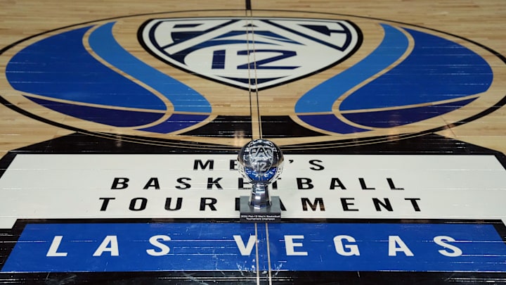 Mar 16, 2024; Las Vegas, NV, USA; The 2024 Pac-12 Conference men's basketball champion trophy at center court on the Pac-12 logo at T-Mobile Arena. Mandatory Credit: Kirby Lee-Imagn Images