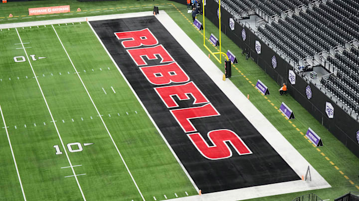 Dec 2, 2023; Las Vegas, NV, USA; The UNLV Rebels logo in the end zone is seen before the Mountain West Championship between the Boise State Broncos and the UNLV Rebels at Allegiant Stadium. Mandatory Credit: Kirby Lee-Imagn Images