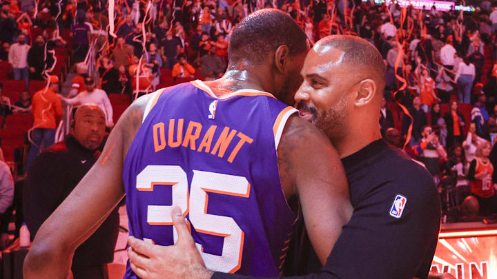 Feb 12, 2025; Houston, Texas, USA; Phoenix Suns forward Kevin Durant (35) hugs Houston Rockets head coach Ime Udoka after a game at Toyota Center. Mandatory Credit: Thomas Shea-Imagn Images