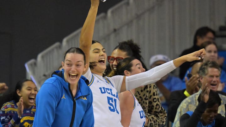 Dec 20, 2025; Los Angeles, California, USA;UCLA Bruins forward Angela Dugalic (32) and center Lauren Betts (51) react after a basket by guard Megan Grant (not pictured) during the second half against Long Beach State Beach at Pauley Pavilion presented by Wescom Financial. Mandatory Credit: Jayne Kamin-Oncea-Imagn Images