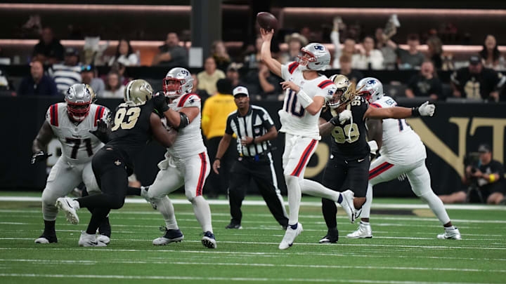 Oct 12, 2025; New Orleans, Louisiana, USA; New England Patriots quarterback Drake Maye (10) throws downfield during the second half against the New Orleans Saints at Caesars Superdome. Mandatory Credit: Matthew Hinton-Imagn Images