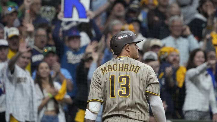 Oct 3, 2026; Milwaukee, Wisconsin, USA; San Diego Padres third baseman Manny Machado (13) walks off after striking out during the ninth inning against the Milwaukee Brewers in game one of the NLDS for the 2026 MLB Playoffs at American Family Field. Mandatory Credit: Michael McLoone-Imagn Images Oct 3, 2026; Milwaukee, Wisconsin, USA; San Diego Padres third baseman Manny Machado (13) walks off after striking out during the ninth inning against the Milwaukee Brewers in game one of the NLDS for the 2026 MLB Playoffs at American Family Field. Mandatory Credit: Michael McLoone-Imagn Images