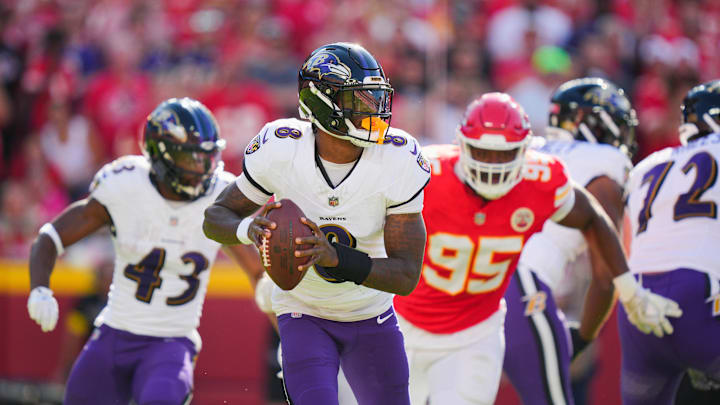 Sep 28, 2025; Kansas City, Missouri, USA; Baltimore Ravens quarterback Lamar Jackson (8) drops back to pass during the first half against the Kansas City Chiefs at GEHA Field at Arrowhead Stadium. Mandatory Credit: Jay Biggerstaff-Imagn Images