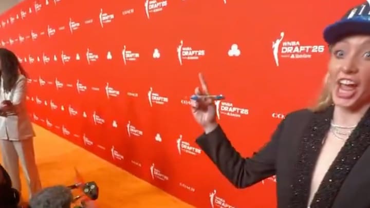 Paige Bueckers reacts to her college teammate getting drafted.