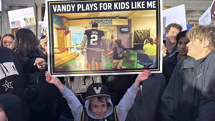 Landon Binkley holds up his home-made sign at Wyatt Lawn when College GameDay came to Vanderbilt in Novemember
