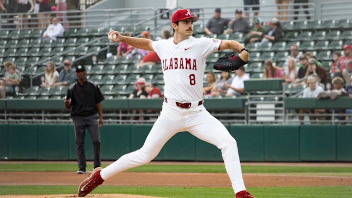 Alabama pitcher Tyler Fay pitches the ball in the first game of the series against Rhode Island on Feb. 20, 2026.