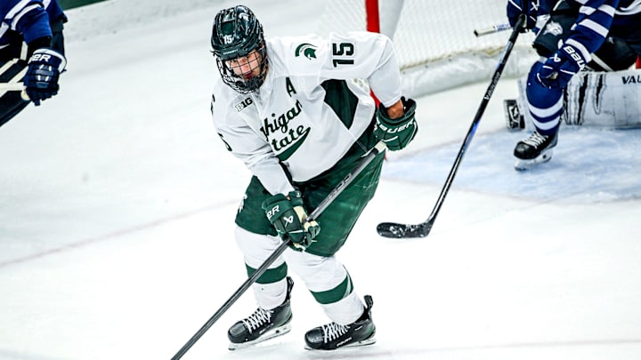 Michigan State's Charlie Stramel moves the puck against New Hampshire during the second period on Thursday, Oct. 9, 2025, at Munn Ice Arena in East Lansing.