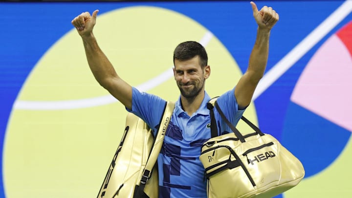 Novak Djokovic waves to the crowd after losing in the 2024 U.S. Open.