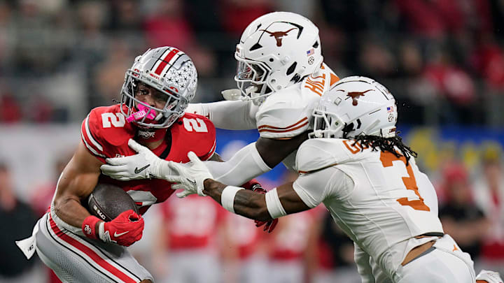 Texas Longhorns defensive back Jaylon Guilbeau (3) and linebacker Anthony Hill Jr. (0) on Jan. 10, 2025, at AT&T Stadium in Arlington, Texas.
