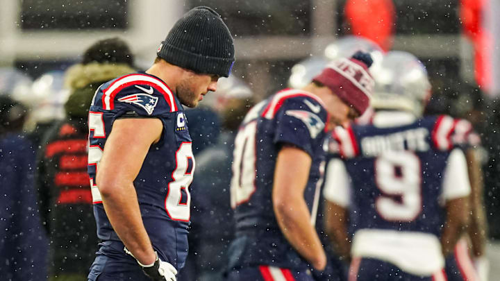Patriots tight end Hunter Henry, left, and quarterback Drake Maye on the sideline at the end of their loss to the Bills.