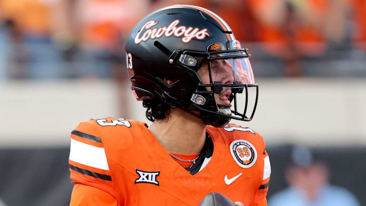 Oklahoma State's Garret Rangel (13) looks to throw the ball in the second half of the college football between the Oklahoma State University Cowboys and the Utah Utes at Boone Pickens Stadium in Stillwater, Okla., Saturday, Sept., 21, 2024.