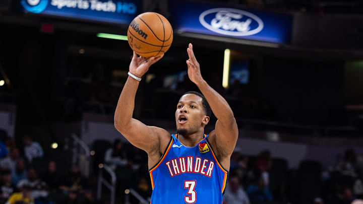 Oct 11, 2025; Indianapolis, Indiana, USA; Oklahoma City Thunder guard Chris Youngblood (3) shoots the ball in the second half against the Indiana Pacers at Gainbridge Fieldhouse. Mandatory Credit: Trevor Ruszkowski-Imagn Images