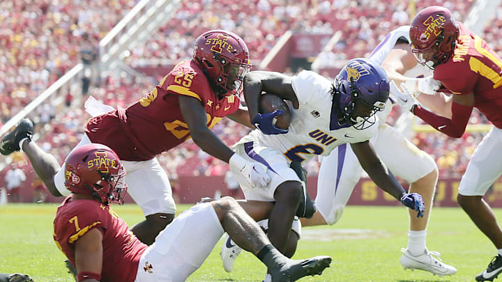 Iowa State Cyclones' defensive back Trevon Howard (25) takes down Northern Iowa Panthers running back Tye Edwards (2) during the first quarter in the season-opening game at Jack Trice Stadium on Saturday, Sept. 2, 2023, in Ames, Iowa.