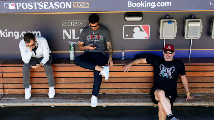 Assistant general manager Amiel Sawdaye, general manager Mike Hazen, and manager Torey Lovullo during batting practice at Dodger Stadium in Los Angeles on Oct. 8, 2023.