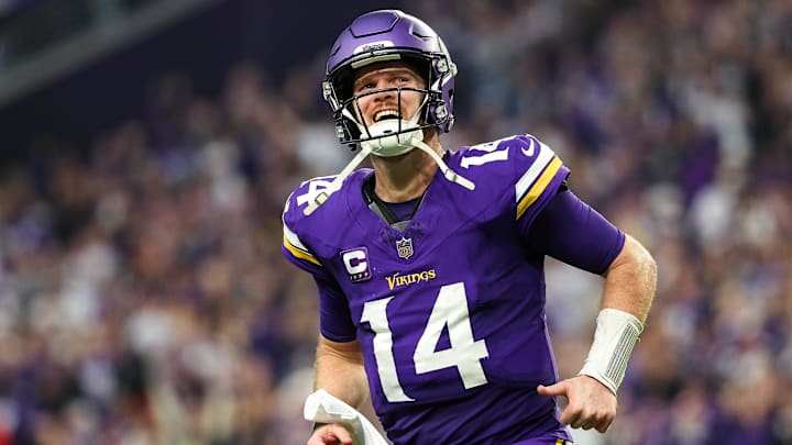 Minnesota Vikings quarterback Sam Darnold celebrates running back Aaron Jones' touchdown run against the Atlanta Falcons during the fourth quarter at U.S. Bank Stadium in Minneapolis on Dec. 8, 2024. Minnesota Vikings quarterback Sam Darnold celebrates running back Aaron Jones' touchdown run against the Atlanta Falcons during the fourth quarter at U.S. Bank Stadium in Minneapolis on Dec. 8, 2024.