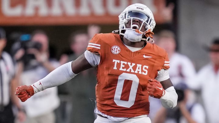 Nov 23, 2024; Austin, Texas, USA; Texas Longhorns linebacker Anthony Hill Jr. (0) celebrates after a stop against the Kentucky Wildcats on fourth down in the third quarter at Darrell K Royal Texas Memorial Stadium. Mandatory Credit: Ricardo B. Brazziell/USA TODAY Network via Imagn Images