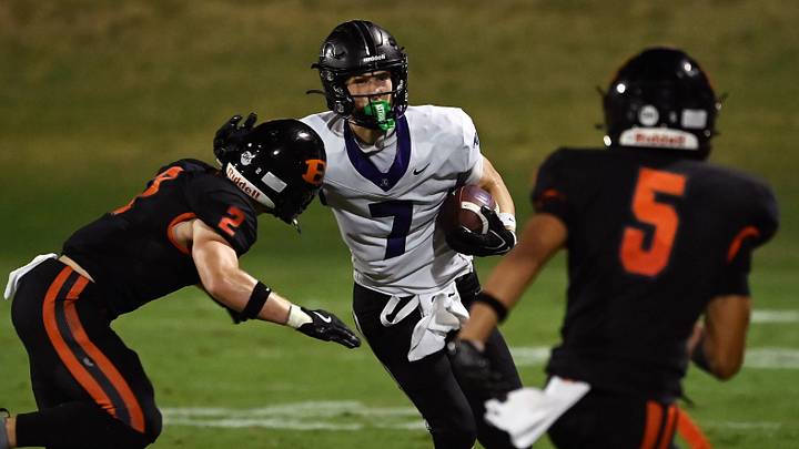 Lipscomb Academy's Drew Rempel (7) runs the ball before being tackled by Ensworth's Daniel Maumus (2) during a TSSAA high school football game on Friday, Sept. 18, 2026, in Nashville, Tenn. Lipscomb Academy's Drew Rempel (7) runs the ball before being tackled by Ensworth's Daniel Maumus (2) during a TSSAA high school football game on Friday, Sept. 18, 2026, in Nashville, Tenn.