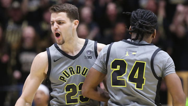 Purdue Boilermakers forward Camden Heide (23) celebrates with guard Gicarri Harris (24) 