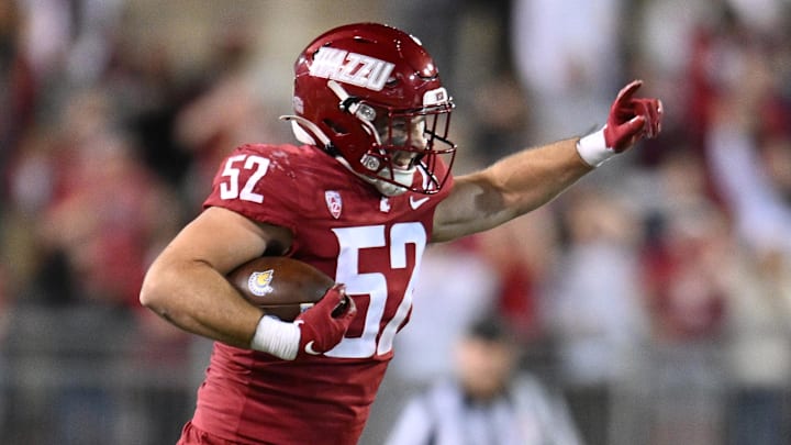Sep 20, 2024; Pullman, Washington, USA; Washington State Cougars linebacker Kyle Thornton (52) celebrate after a play against the San Jose State Spartans in the second half at Gesa Field at Martin Stadium. Mandatory Credit: James Snook-Imagn Images