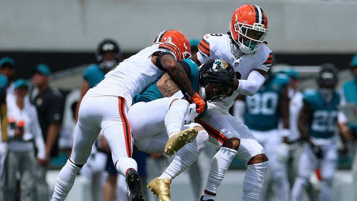 Jacksonville Jaguars wide receiver Parker Washington (11) is tackled by Cleveland Browns cornerback Tyson Campbell (7) and safety Grant Delpit (9) after a reception in the first quarter at EverBank Stadium. Mandatory Credit: Nathan Ray Seebeck-Imagn Images Jacksonville Jaguars wide receiver Parker Washington (11) is tackled by Cleveland Browns cornerback Tyson Campbell (7) and safety Grant Delpit (9) after a reception in the first quarter at EverBank Stadium. Mandatory Credit: Nathan Ray Seebeck-Imagn Images