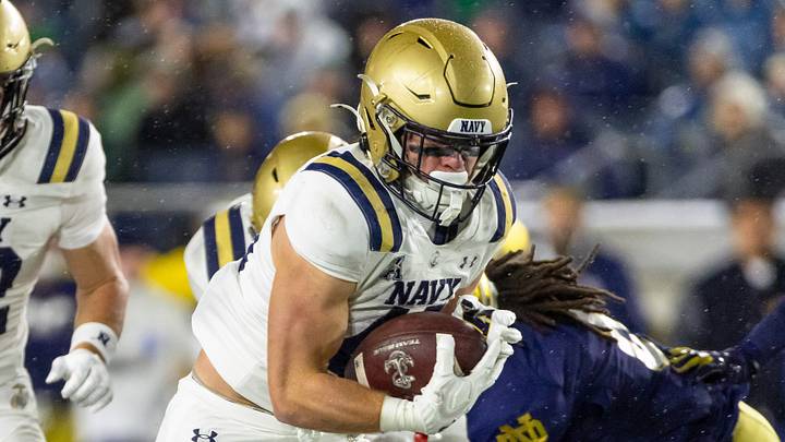 Nov 8, 2025; South Bend, Indiana, USA; Navy Midshipmen fullback Alex Tecza (46) runs the ball against the Notre Dame Fighting Irish during the first half at Notre Dame Stadium. Mandatory Credit: Michael Caterina-Imagn Images
