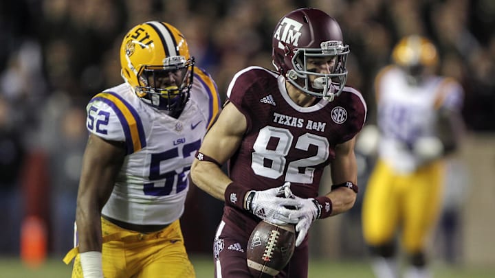 exas A&M Aggies wide receiver Boone Niederhofer (82) makes a reception during the third quarter as LSU Tigers linebacker Kendell Beckwith (52) defends at Kyle Field. The Tigers defeated the Aggies 23-17. Mandatory Credit: Troy Taormina-Imagn Images