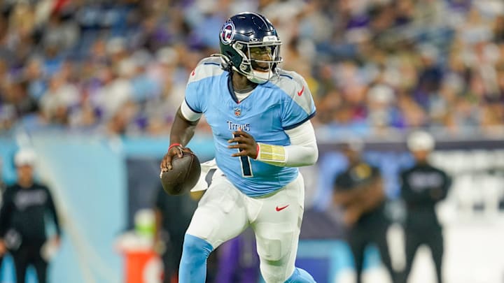 Tennessee Titans quarterback Cam Ward (1) runs the ball during the second quarter of an NFL pre-season game against the Minnesota Vikings at Nissan Stadium in Nashville, Tenn., Friday, Aug. 22, 2025.