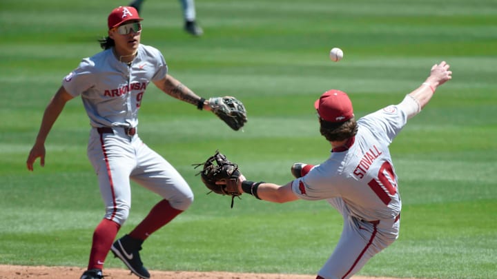 Apr 14, 2024; Tuscaloosa, AL, USA; A hard hit ball up the middle gets away from Arkansas second