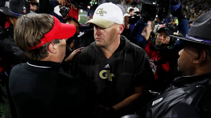 Georgia coach Kirby Smart and Georgia Tech coach Brent Key shake hands after a NCAA college football game against Georgia Tech in Atlanta, on Saturday, Nov. 25, 2023.Georgia won 31-23.