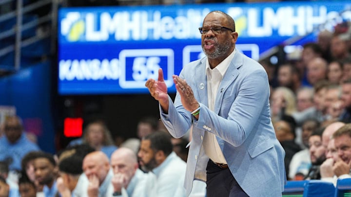 Nov 8, 2024; Lawrence, Kansas, USA; North Carolina Tar Heels head coach Hubert Davis reacts during the second half against the Kansas Jayhawks at Allen Fieldhouse. Mandatory Credit: Jay Biggerstaff-Imagn Images