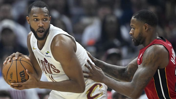 Apr 20, 2025; Cleveland, Ohio, USA; Miami Heat forward Haywood Highsmith (24) defends Cleveland Cavaliers forward Evan Mobley (4) in the first quarter at Rocket Arena. Mandatory Credit: David Richard-Imagn Images