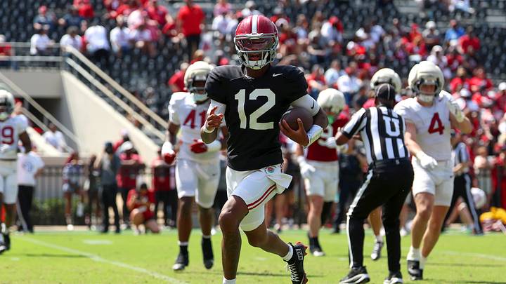 Apr 11, 2026; Tuscaloosa, AL, USA; Alabama Crimson Tide quarterback Keelon Russell (12) runs the ball during the Alabama A-Day spring football scrimmage game at Saban Field at Bryant-Denny Stadium. Mandatory Credit: David Leong-Imagn Images Apr 11, 2026; Tuscaloosa, AL, USA; Alabama Crimson Tide quarterback Keelon Russell (12) runs the ball during the Alabama A-Day spring football scrimmage game at Saban Field at Bryant-Denny Stadium. Mandatory Credit: David Leong-Imagn Images