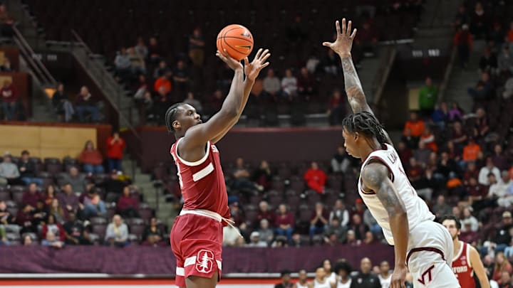 Jan 7, 2026; Blacksburg, Va.; Stanford forward Chisom Okpara (10) shoots a shot over Virginia Tech forward Tobi Lawal (1). Jan 7, 2026; Blacksburg, Va.; Stanford forward Chisom Okpara (10) shoots a shot over Virginia Tech forward Tobi Lawal (1).