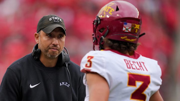 Iowa State Cyclones head coach Matt Campbell celebrates with quarterback Rocco Becht (3) after he scores a touchdown against the Cincinnati Bearcats in the first half at Nippert Stadium. Iowa State Cyclones head coach Matt Campbell celebrates with quarterback Rocco Becht (3) after he scores a touchdown against the Cincinnati Bearcats in the first half at Nippert Stadium.