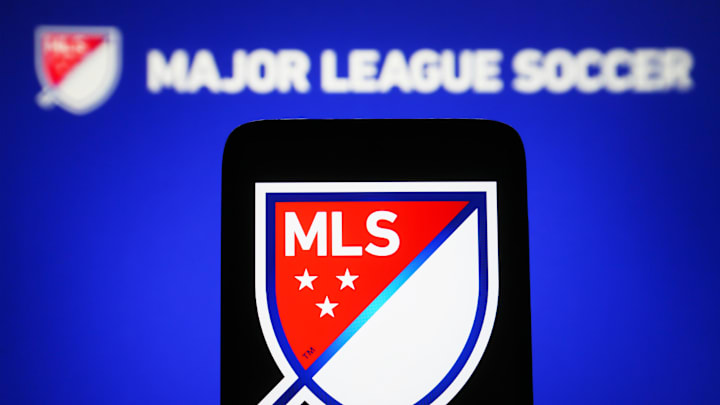 In this photo illustration, Major League Soccer (MLS) logo...
