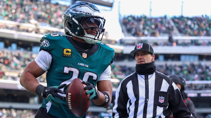 Dec 14, 2025; Philadelphia, Pennsylvania, USA; Philadelphia Eagles running back Saquon Barkley (26) reacts after scoring a touchdown against the Las Vegas Raiders during the second quarter at Lincoln Financial Field. Mandatory Credit: Bill Streicher-Imagn Images