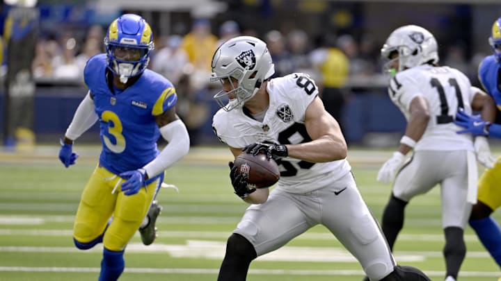 Oct 20, 2024; Inglewood, California, USA; Las Vegas Raiders tight end Brock Bowers (89) catches a pass with Los Angeles Rams safety Kamren Curl (3) defending during the first half at SoFi Stadium. Mandatory Credit: Alex Gallardo-Imagn Images