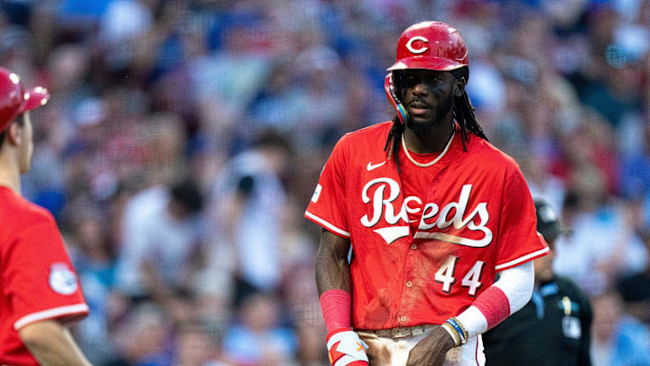 Cincinnati Reds shortstop Elly De La Cruz (44) takes off his base running gloves after being stranded on third base in the second inning between Cincinnati Reds and Chicago Cubs at Great American Ball Park in Cincinnati on Sept. 20, 2025.