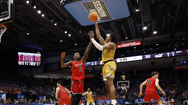 Alabama State guard TJ Madlock shoots the ball.