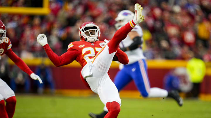 Dec 10, 2023; Kansas City, Missouri, USA; Kansas City Chiefs safety Chamarri Conner (27) intercepts a pass during the first half against the Buffalo Bills at GEHA Field at Arrowhead Stadium. Mandatory Credit: Jay Biggerstaff-USA TODAY Sports