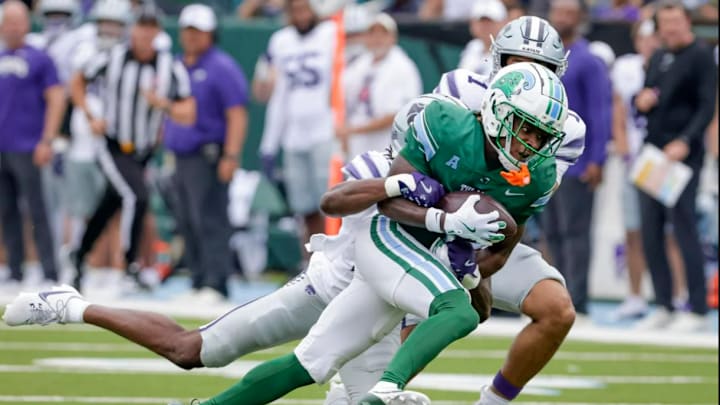 Tulane wide receiver Mario Williams (4) makes a long pass reception against Kansas State during the second half of an NCAA football game at Yulman Stadium in New Orleans, Saturday, Sept. 7, 2024. Tulane wide receiver Mario Williams (4) makes a long pass reception against Kansas State during the second half of an NCAA football game at Yulman Stadium in New Orleans, Saturday, Sept. 7, 2024.